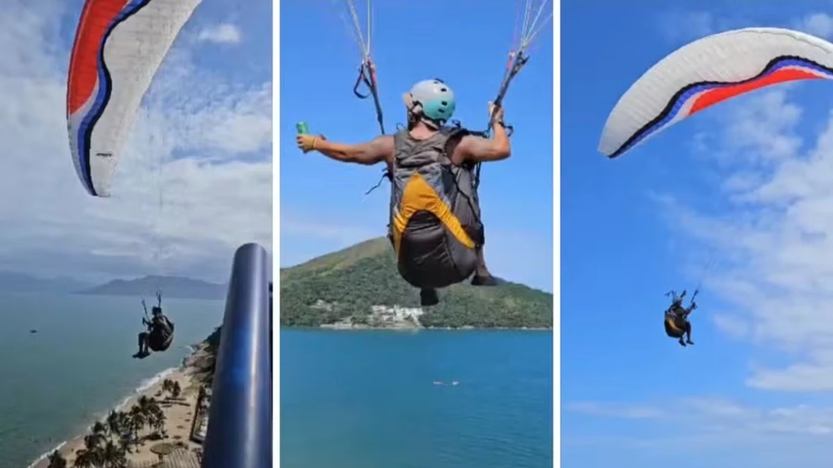 Piloto de parapente pega lata de cerveja em cobertura durante voo em Caraguatatuba