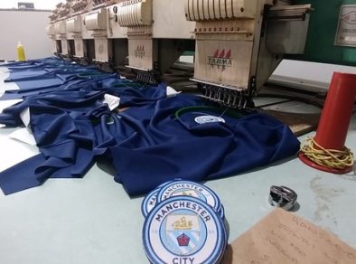 Polícia apreende mais de 150 mil peças de roupa falsas em Potim