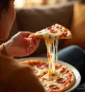 Mulher morre e sobrinho é internado após comerem pizza na zona…